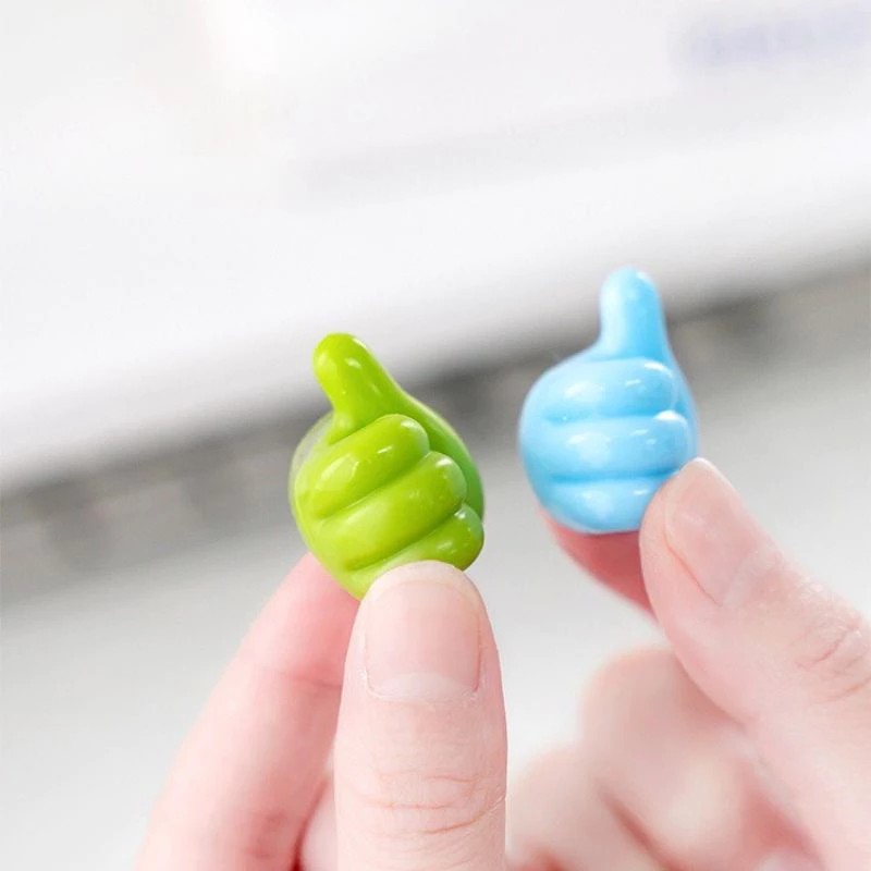 Unique hand shaped headphone cable hanger