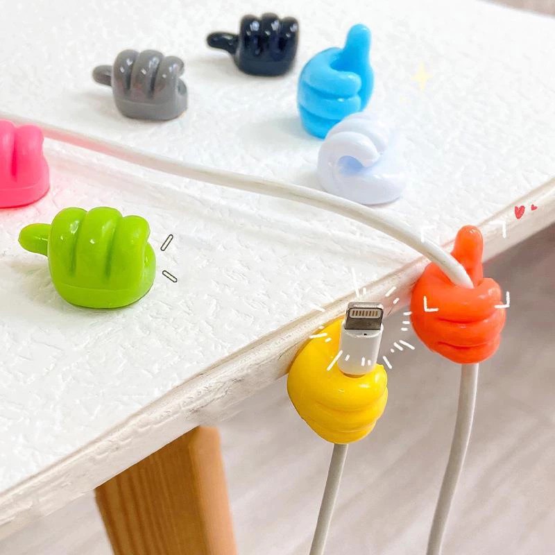 Unique hand shaped headphone cable hanger