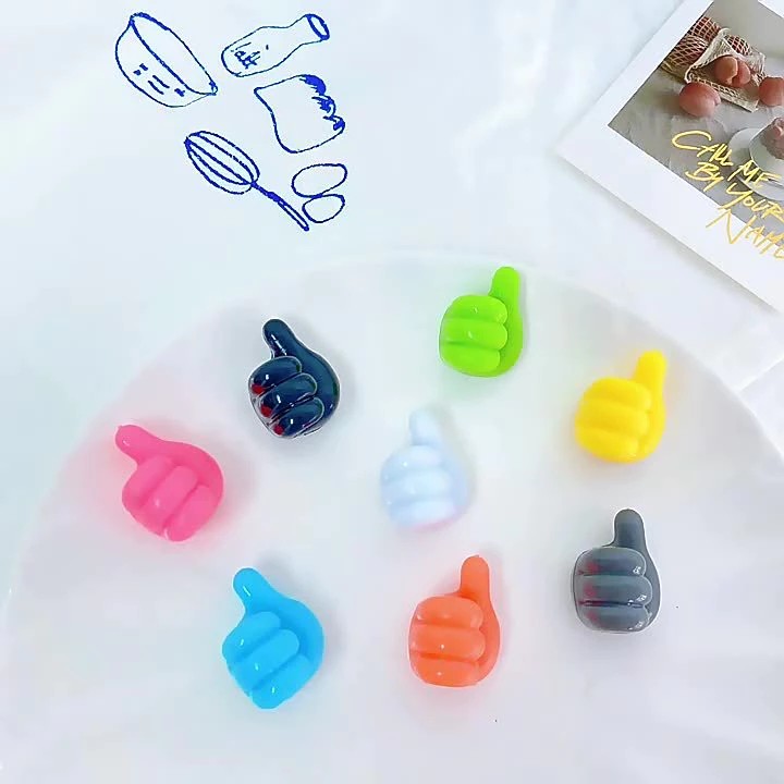 Unique hand shaped headphone cable hanger